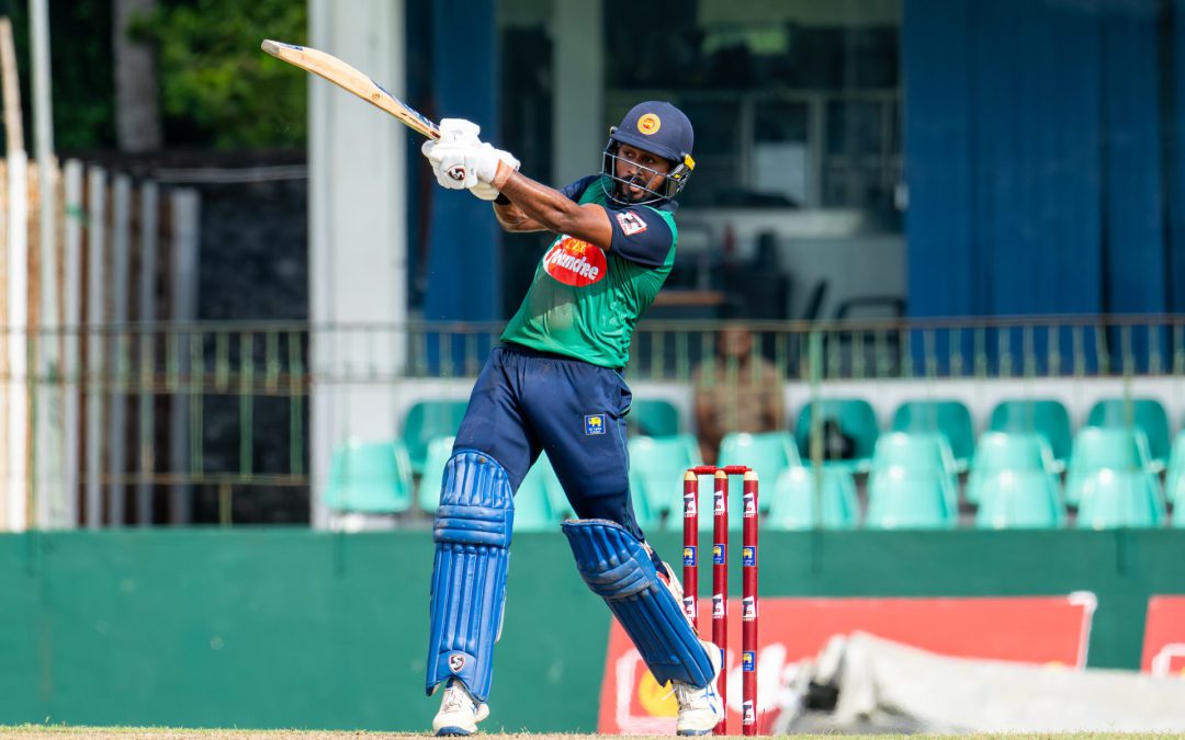 Kamindu Mendis a rescuing captain’s half ton, Chamika 42 & 2 wkts. Hemantha 4/18 as SLC Greens make SLC Blues see green